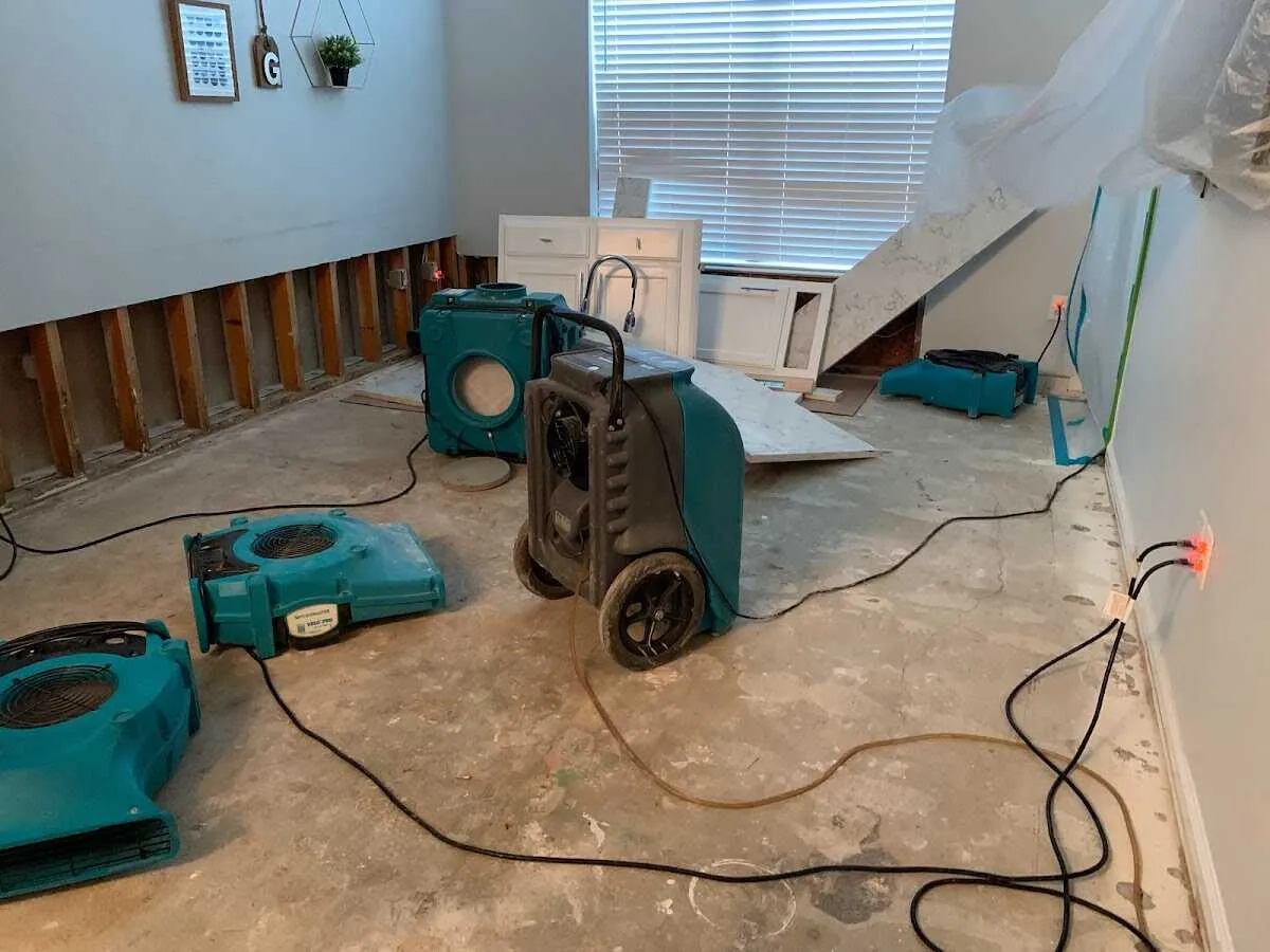 Dehumidifier in flood-cut room for Water Damage Restoration in McPherson